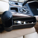 Opbergbak naast de stoel zwart